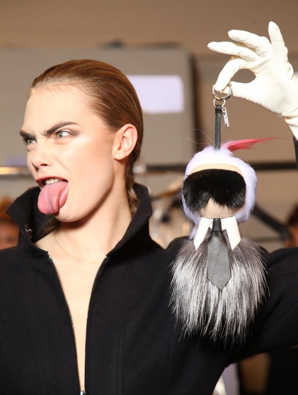 Cara Delevingne shows what she thinks of the Karl Lagerfeld keychain by Fendi