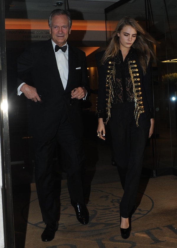 Charles Delevingne and his daughter Cara Delevingne wear matching sleek black ensembles