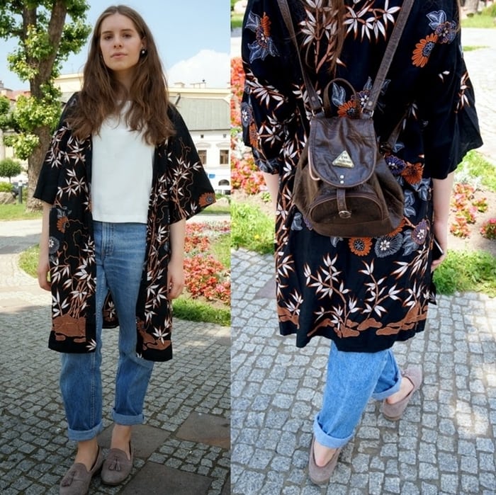 Claudia perfectly styles her kimono with boyfriend jeans, balancing comfort with style