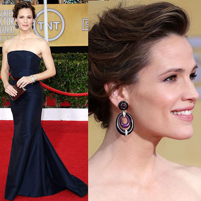 Jennifer Garner in a navy Max Mara dress, Brian Atwood shoes, Salvatore Ferragamo clutch, and David Webb jewelry at the 20th Annual Screen Actors Guild Awards