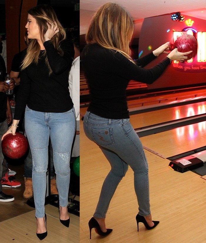 Khloe Kardashian shows off her bowling skills in skinny jeans and black "So Kate" pumps