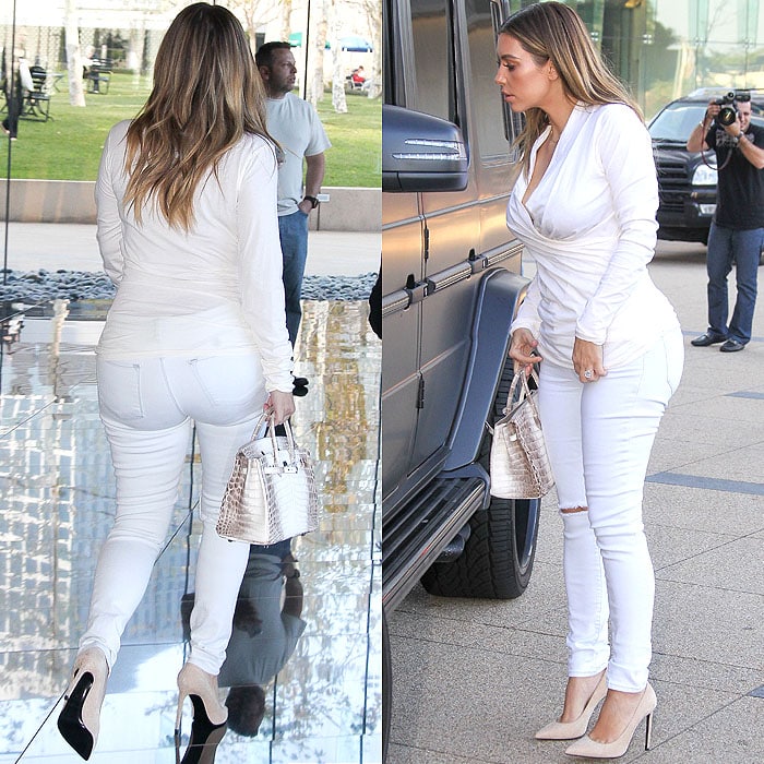 Kim Kardashian steps out in an all-white ensemble with nude heels while visiting an office in Century City, Los Angeles, California, on January 10, 2014