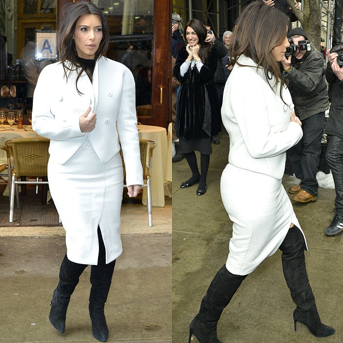 Kim Kardashian pairs a chic white ensemble with Alexander Wang's suede Sofia knee boots during an outing