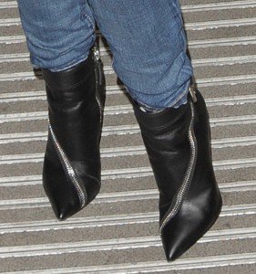 Kylie Minogue With Blonde Curly Hair in Jeans & Black Zip Boots
