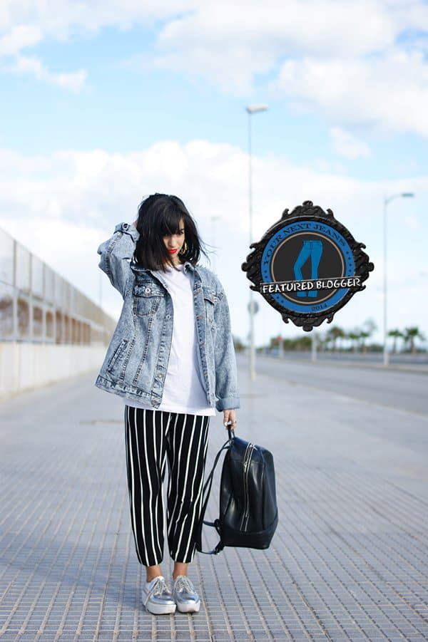 Lucia wearing a tomboy denim jacket with slouchy printed pants