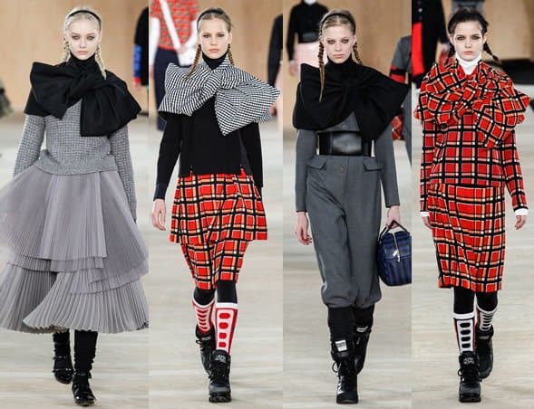 Models showcase the Marc by Marc Jacobs Fall 2014 collection at New York Fashion Week, featuring bold checkered patterns, oversized bow collars, and layered skirts