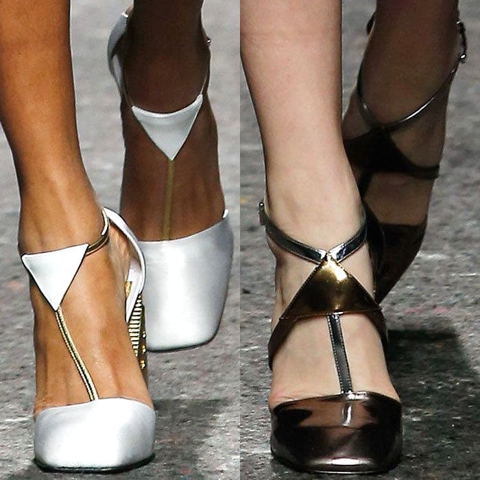 Prada's chic metallic pumps with T-bar straps and angular geometric detailing featuring glossy silver and bronze finishes