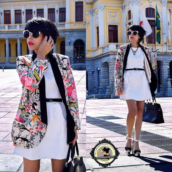 Priscila effortlessly wears a kimono over her office dress, adding flair to professional wear
