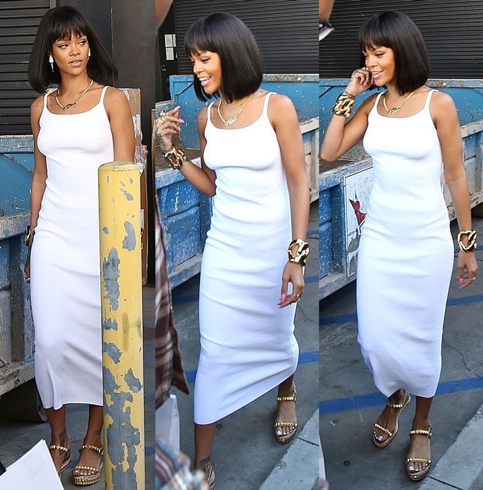 Rihanna trying to escape the paparazzi in a skintight tea-length tank dress