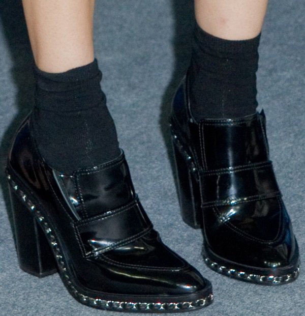 Diane Kruger wore socks and chain-embellished ankle boots