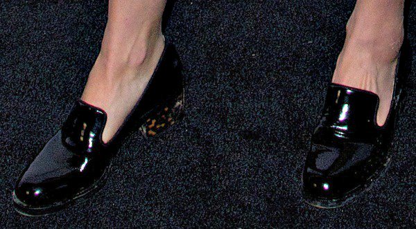 Dree Hemingway's black loafers in glossy patent leather