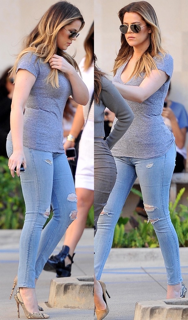 Khloé Kardashian looked dangerously sexy in her tight shirt and Rag & Bone skinny jeans in Bromley