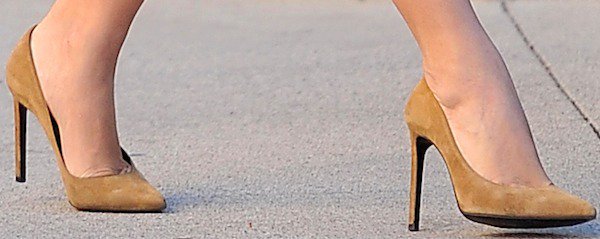 Kim Kardashian wearing tan suede heels from Saint Laurent