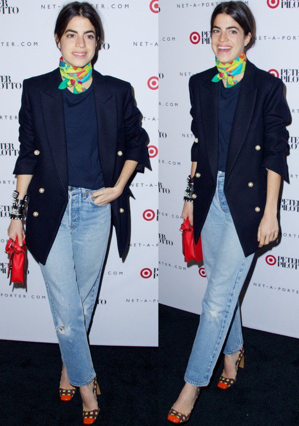 Leandra Medine in an oversized navy blazer over a blue shirt