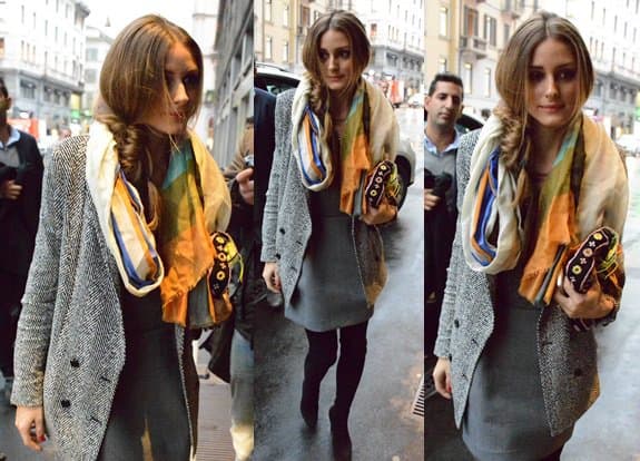 Olivia Palermo adds color to her outfit with a colorblock scarf and a beautifully embroidered purse as she arrives at the Elisabetta Franchi presentation