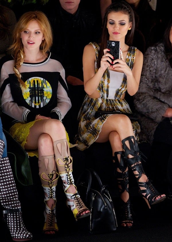 Victoria Justice and Bella Thorne sitting front row at the Rebecca Minkoff fashion show during Mercedes Benz Fashion Week in New York City on February 7, 2014