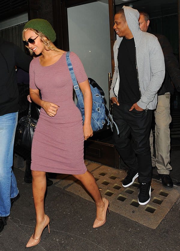 Jay Z keeps it casual in a hoodie, black shirt, jeans, and stylish kicks while out in London