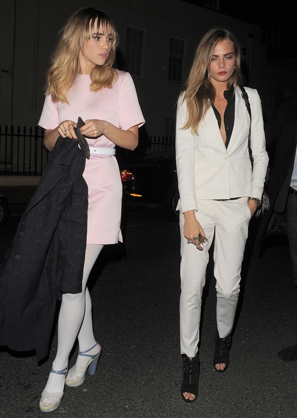 Cara Delevingne with Suki Waterhouse leaving a VIP dinner at Harrods for Karl Lagerfeld in London, England, on March 14, 2014