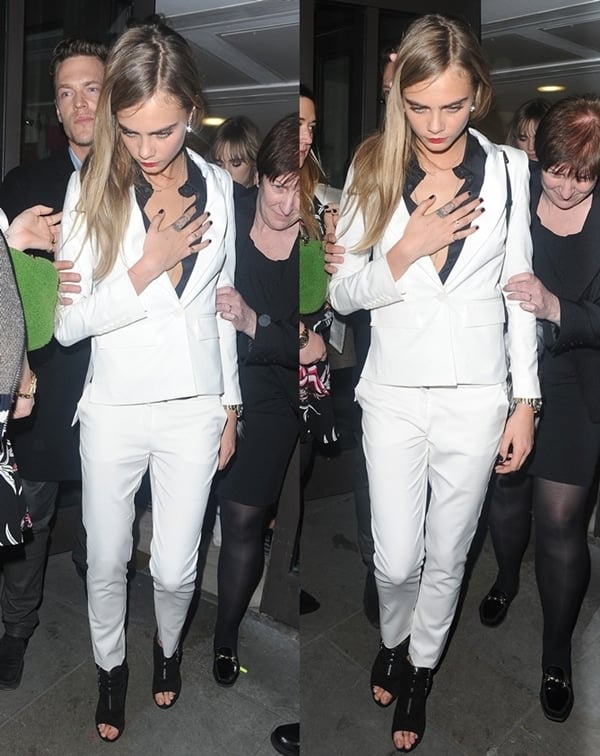 Cara Delevingne in a buttoned-down inner blouse that added major oomph to her ensemble