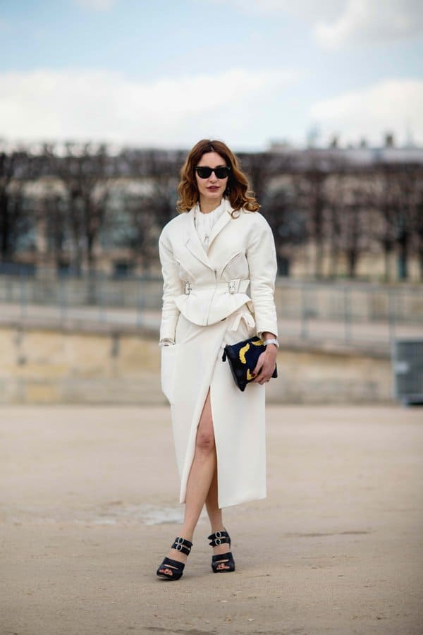 Ece Sukan in a peplum jacket and wrap skirt