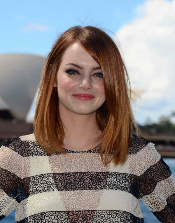 Emma Stone's flawless makeup and sleek bob hairstyle at 'The Amazing Spiderman 2' photo call in Sydney highlight her striking eyes and radiant smile