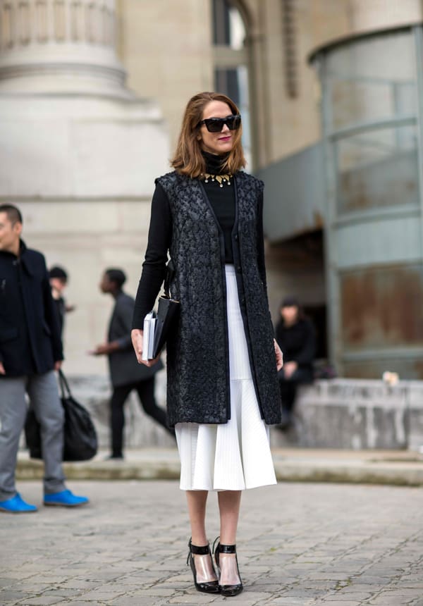 J.J. Martin in a midi flounce skirt and long vest