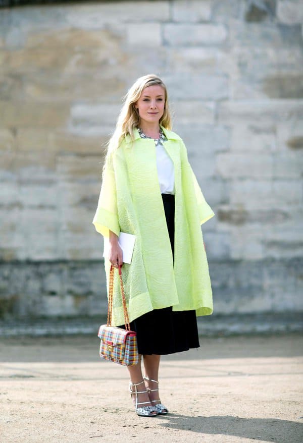 Kate Foley in an oversized coat and full midi skirt