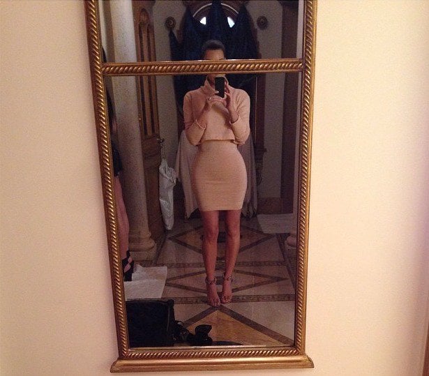 Kim Kardashian takes a selfie of her latest outfit on March 13, 2014
