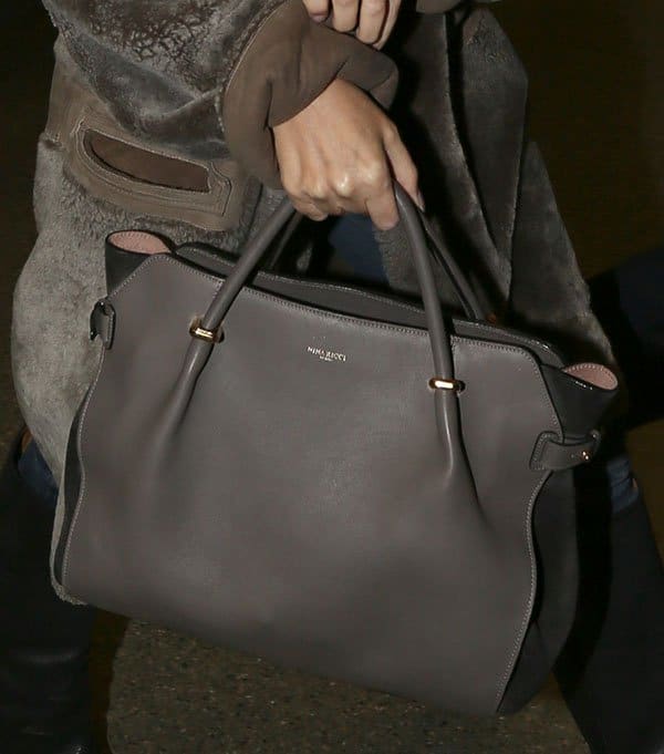 Nina Ricci’s Le Marché bag: A sleek, minimalist satchel with signature push-pin tabs and rolled top handles
