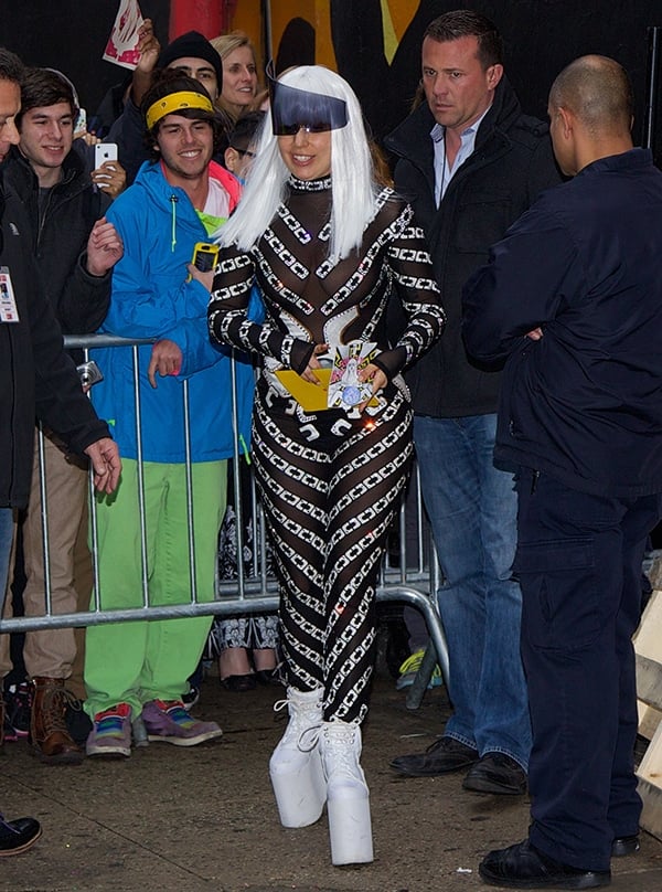 Lady Gaga's futuristic black mesh suit with white chain-like prints