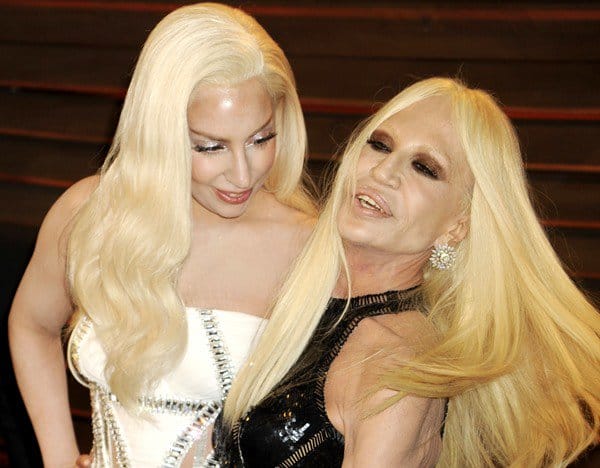 Lady Gaga and Donatella Versace pose for photos together at the Vanity Fair Oscars Party