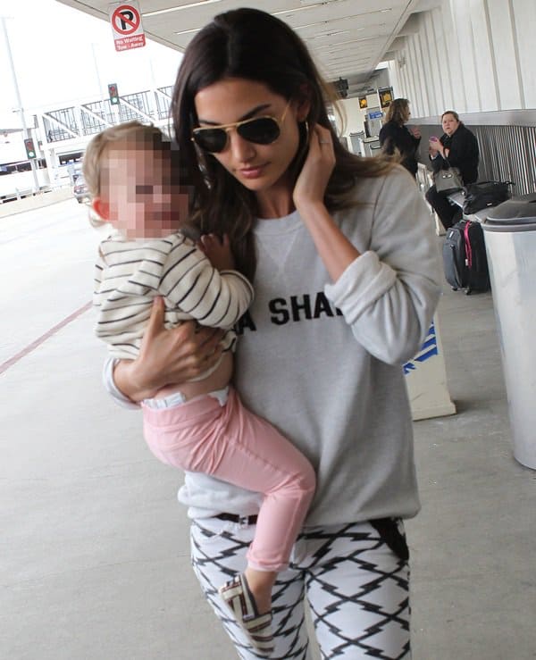 Lily Aldridge at LAX with daughter Dixie Pearl Followill, March 26, 2014