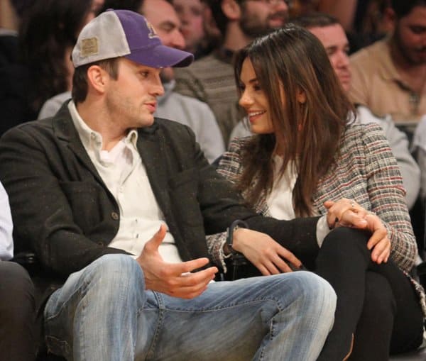 Mila Kunis and Ashton Kutcher at a Los Angeles Lakers game