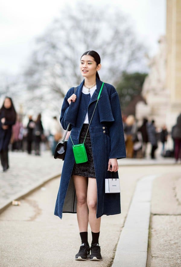 Ming Xi in a 40s-inspired pencil skirt and coat with sneakers