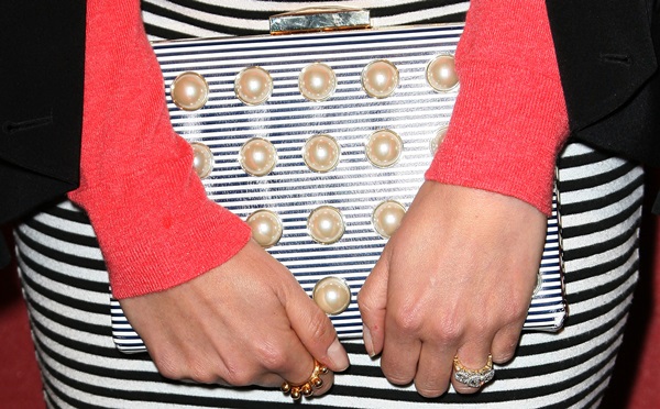 Nikki Reed shows off her pearl-embellished Kate Spade Georgica Road Emanuelle clutch