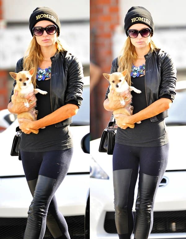 Paris Hilton stuns in black skinny leather chap jeans by R13 while arriving at Meche Salon in Beverly Hills on March 7, 2014