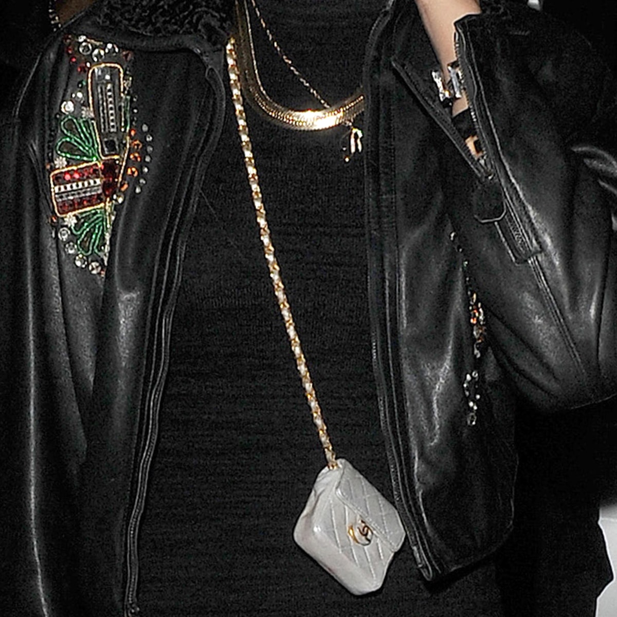 Rihanna with the smallest Chanel bag we've ever seen