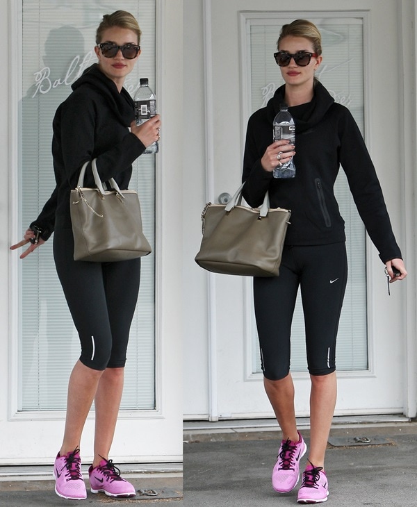 Rosie Huntington-Whiteley wears a Nike hoodie with cropped leggings during a gym outing