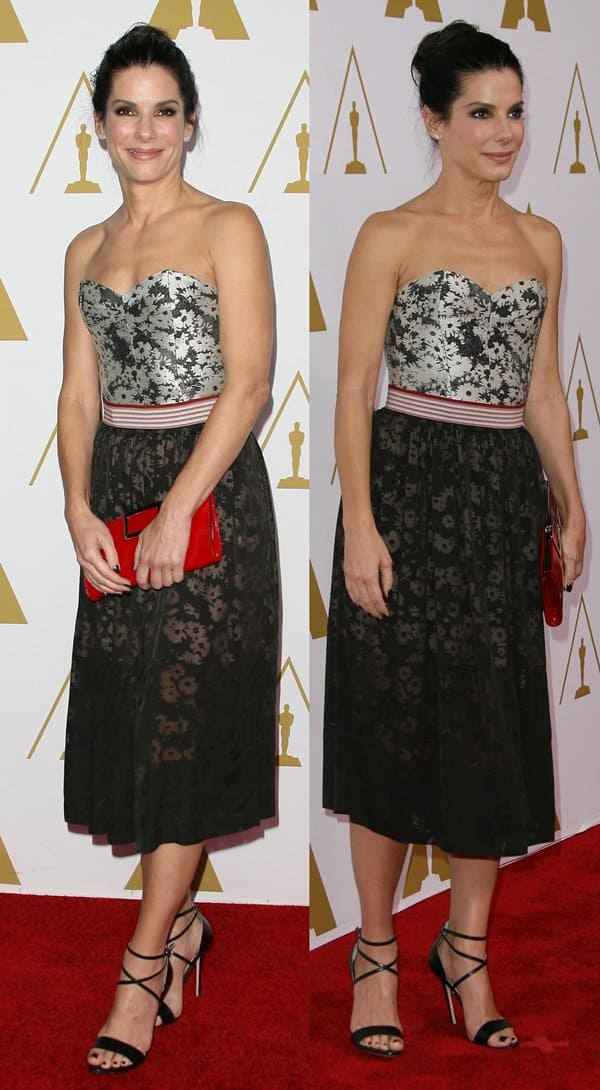 Sandra Bullock styled her strapless Stella McCartney dress with black sandals