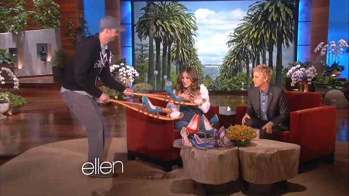 Ellen DeGeneres gives Sarah Jessica Parker a pair of high-heeled snowshoes on an episode