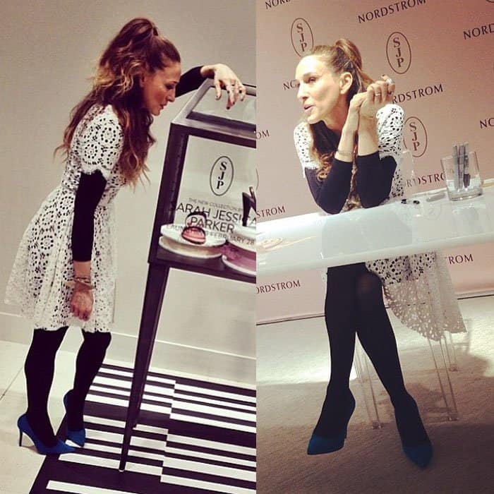Sarah Jessica Parker showcases her SJP Collection in a white Dolce & Gabbana eyelet dress, layered over a full-length black bodysuit, at The Grove in Los Angeles on March 6, 2014