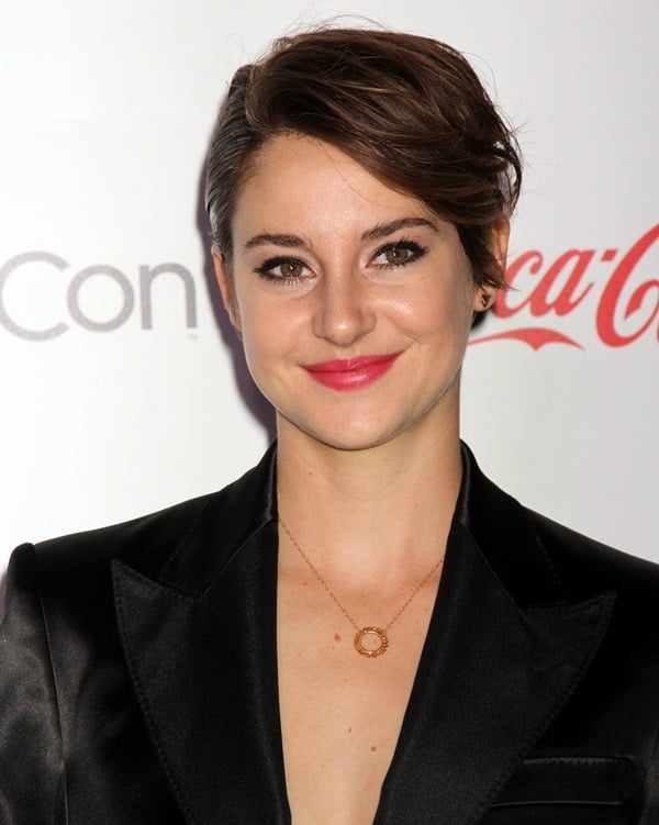 Shailene Woodley embraces a sleek look with her cropped hair styled to one side and a pop of color on her lips