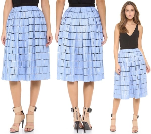 A slick coating gives this Tibi skirt a glossy sheen, and pleats accentuate the full silhouette