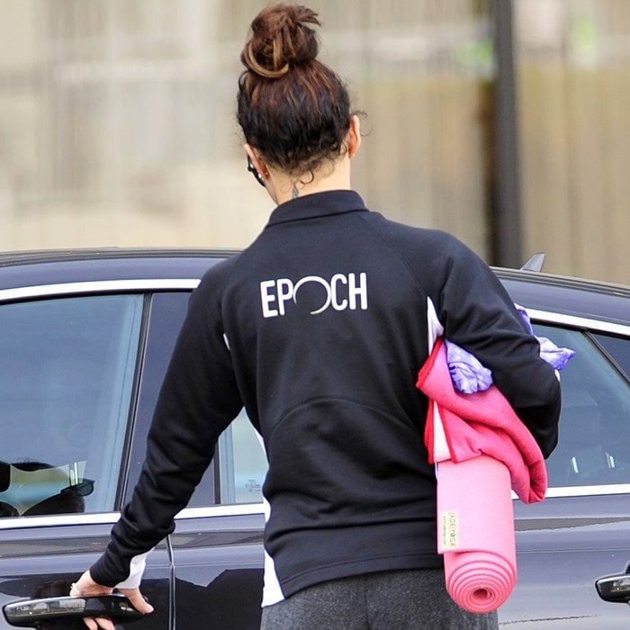 Vanessa Hudgens carries a pink Jade yoga mat as she heads to a fitness class in Los Angeles