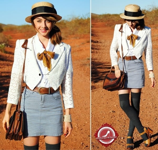 Autilia Antonucci  giving her tailored outfit a casual spin by pairing it with gray over-the-knee socks and brown platform sandals