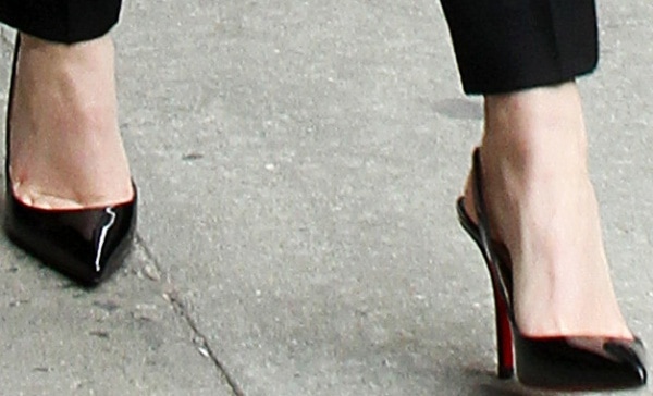 Emma Watson rocking Christian Louboutin Apostrophy Sling pumps