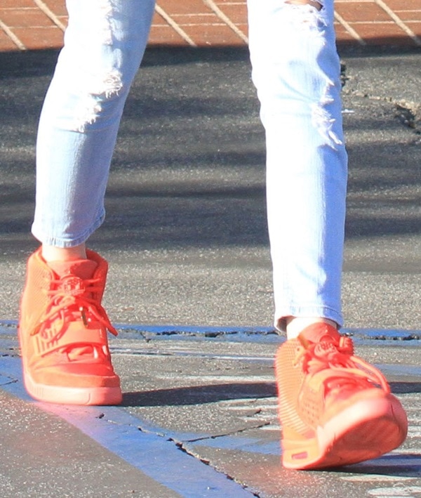 Kendall Jenner's chunky poppy-coral-hued Nike Air Red October Yeezy 2 sneakers