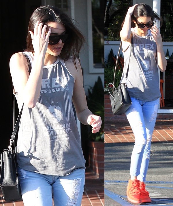 Kendall Jenner shopping at Fred Segal in bright coral red hi-top sneakers in Hollywood on March 12, 2014 