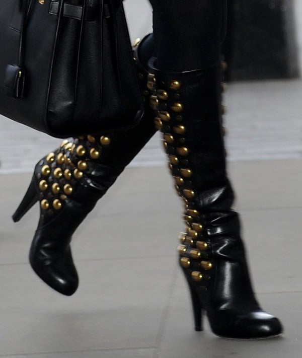 Kylie Minogue used the boots to cap off a gold-on-black ensemble