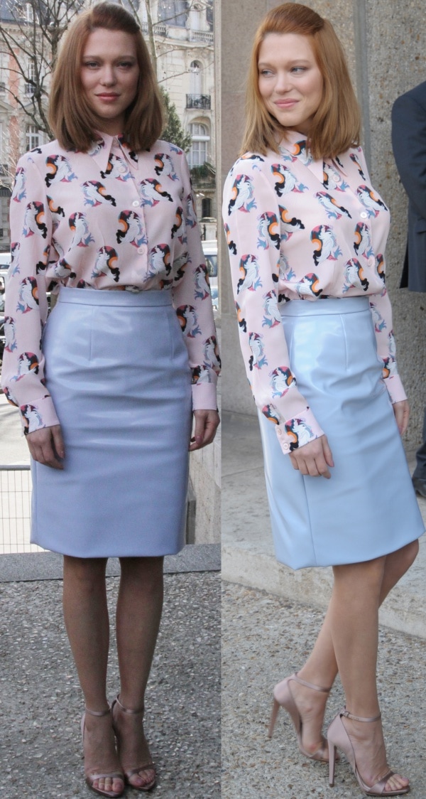 Léa Seydoux stuns in a pastel pink printed blouse paired with a sleek pale blue vinyl skirt and nude ankle-strap sandals at the Miu Miu Fall/Winter 2014 show during Paris Fashion Week